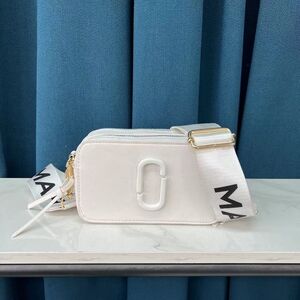Elegant White Crossbody Bag with Bold Strap